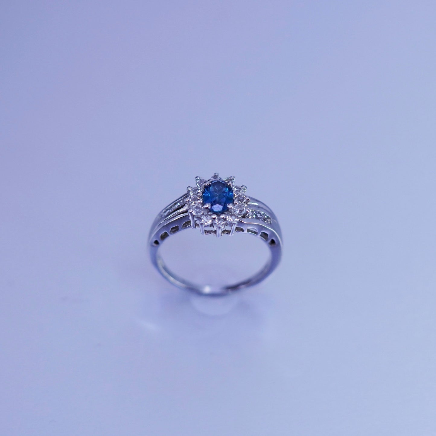 Size 8.25, vintage Sterling 925 silver handmade ring with topaz and cz around