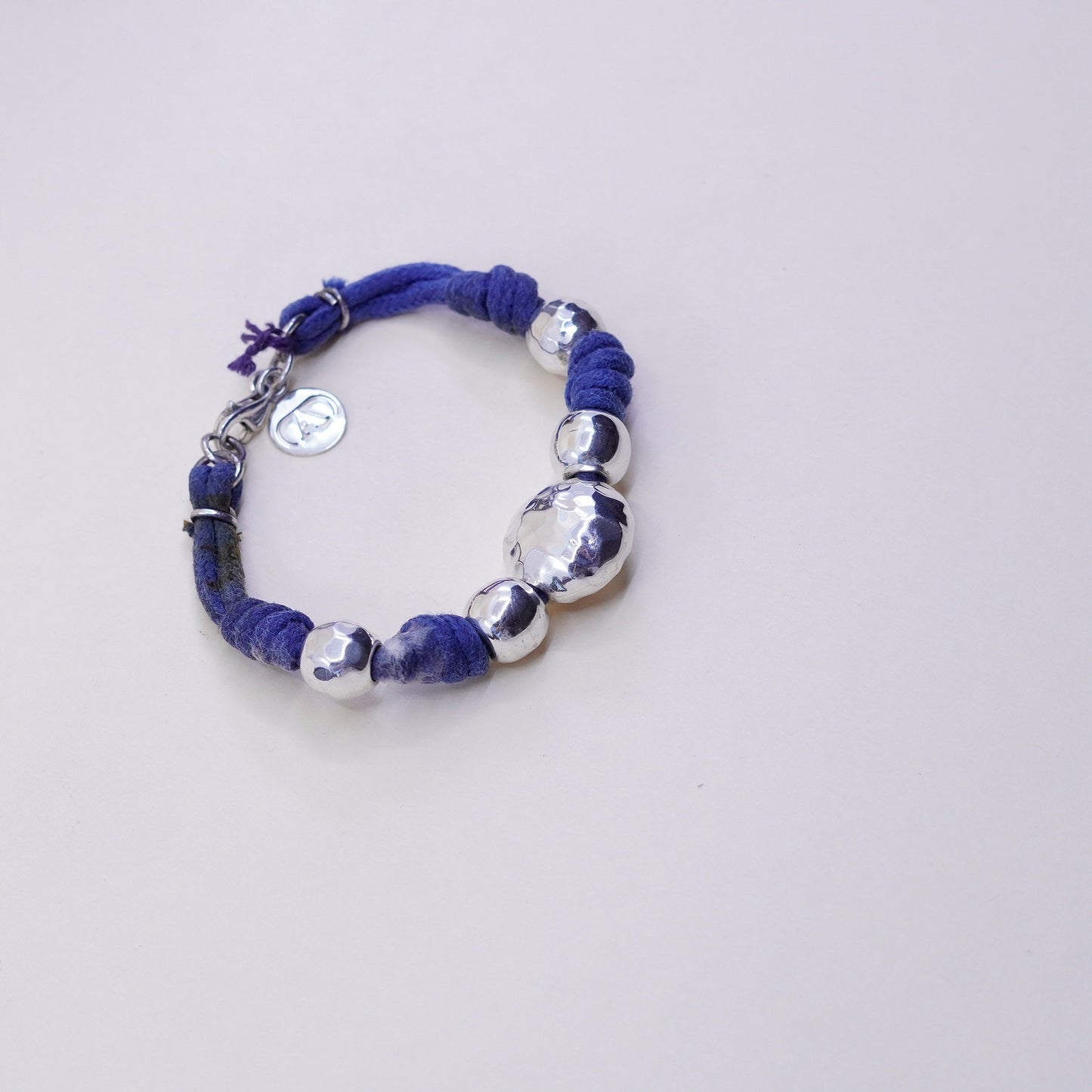 5.75”, vtg Sterling 925 silver bracelet, with linen thread and hammered beads