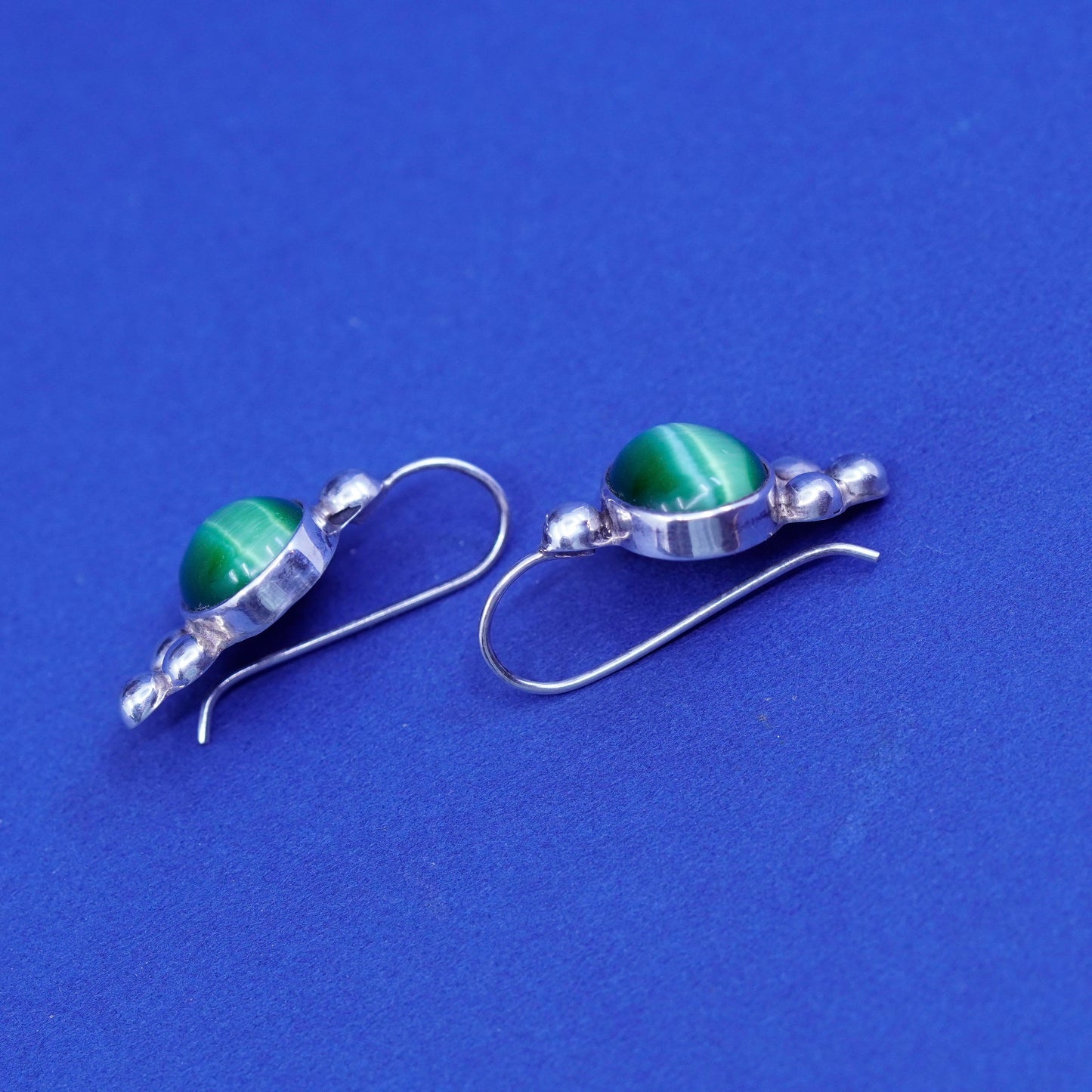 Sterling silver handmade earrings, mexico 925 with lime green cats eye and bead