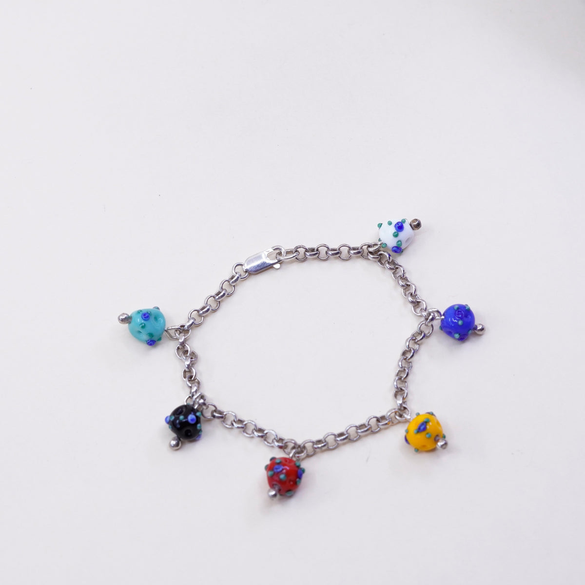 7.25”, 925 Sterling silver circle bracelet w/ artisan colorful glass beads