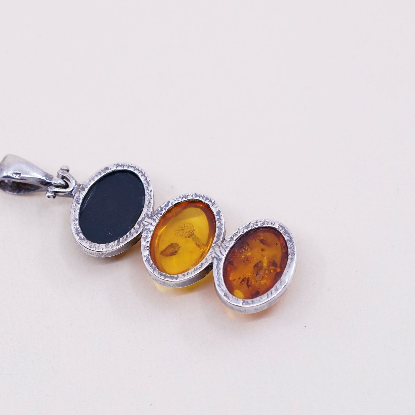 Vintage sterling 925 silver handmade pendant with oval amber