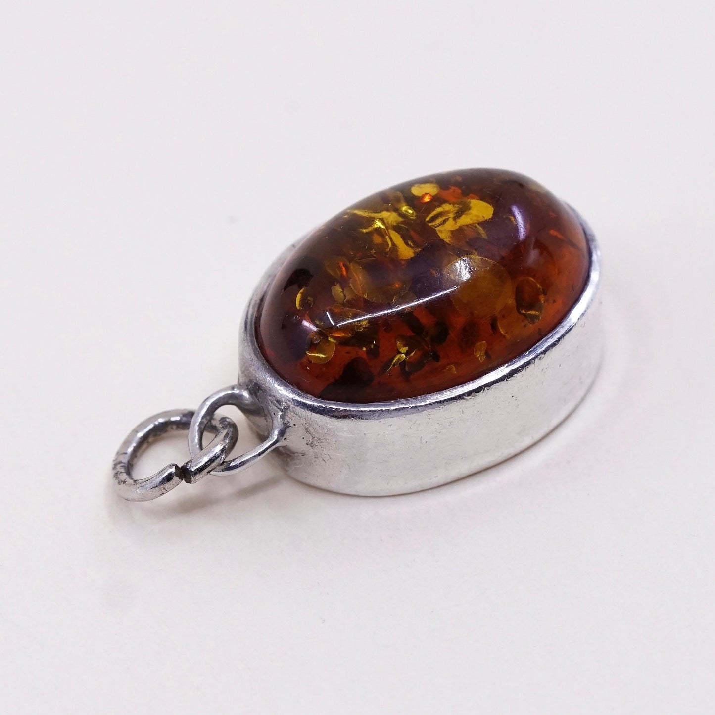 Vintage Lori Bonn sterling 925 silver handmade pendant with oval amber