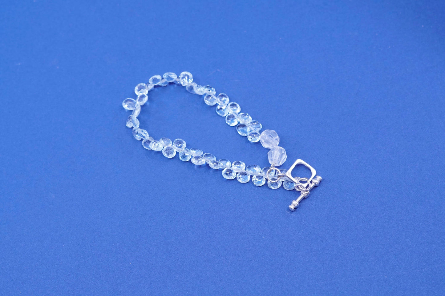 7.5”, sterling silver handmade bracelet, 925 toggle closure blue crystal beads
