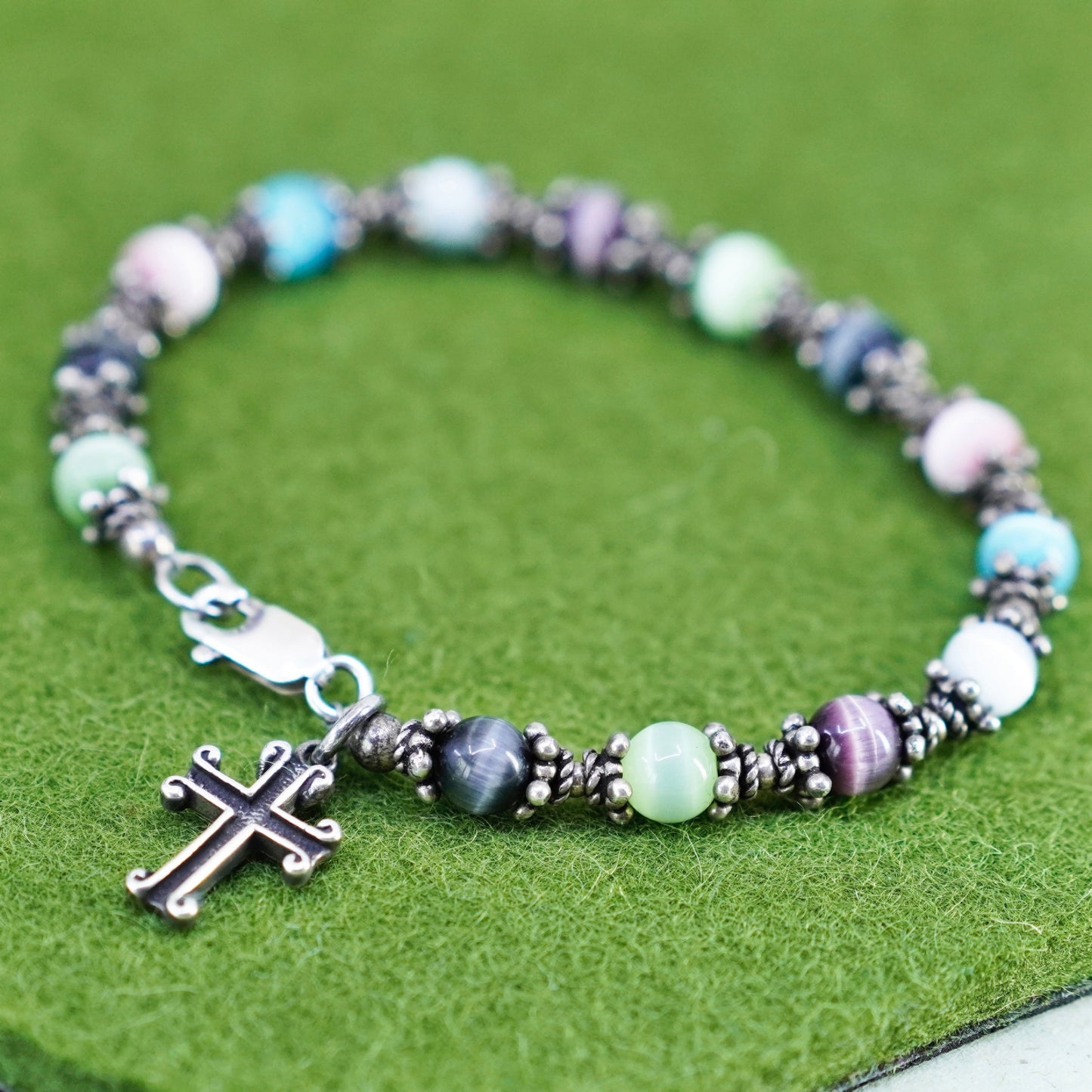 6.75”, sterling silver bracelet, 925 beads with colorful cats eye cross charm