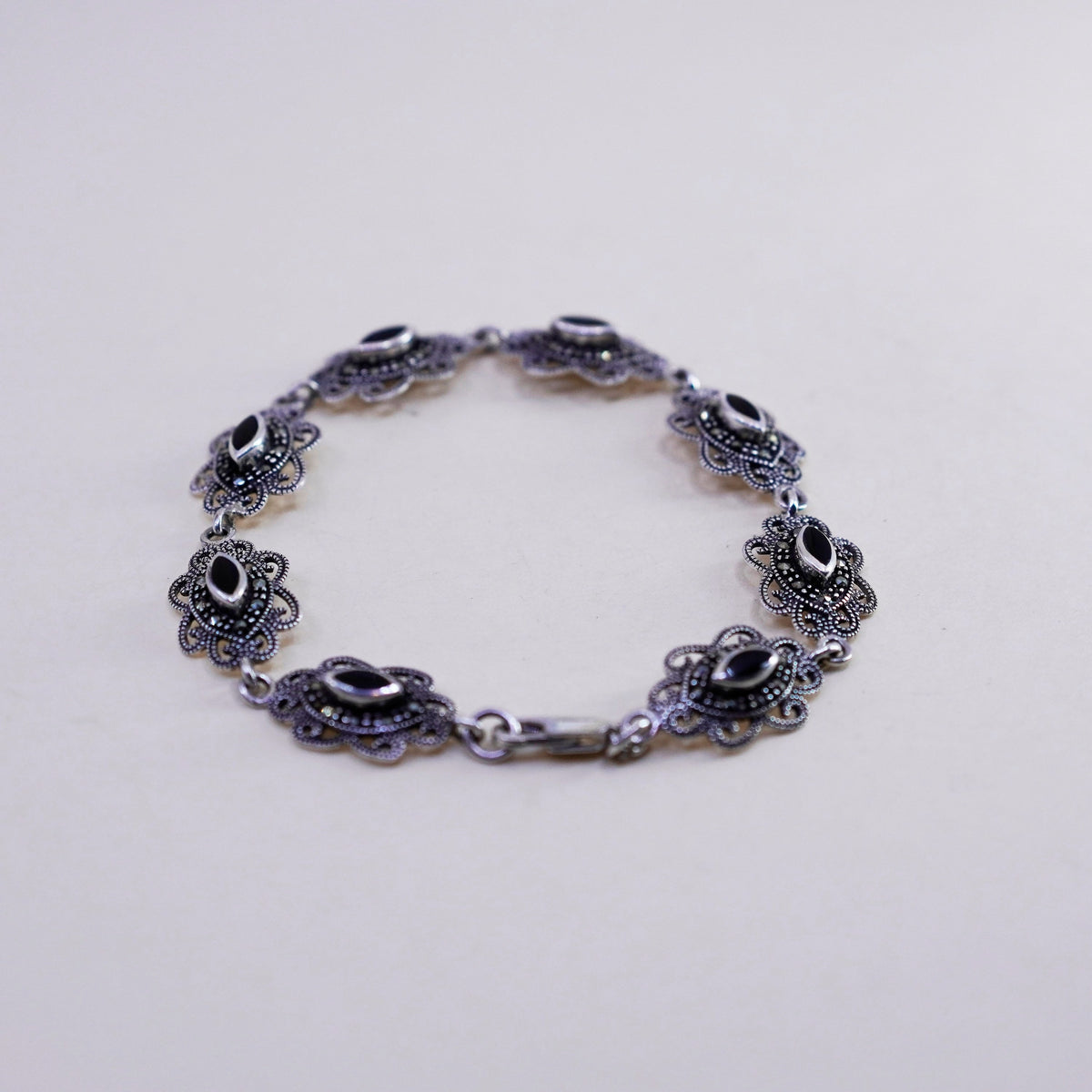 7.5”, sterling 925 silver handmade tennis bracelet w/ obsidian and marcasite