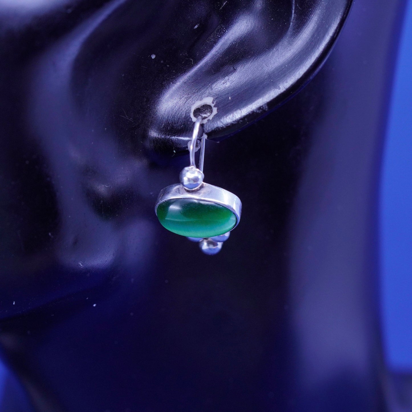 Sterling silver handmade earrings, mexico 925 with lime green cats eye and bead