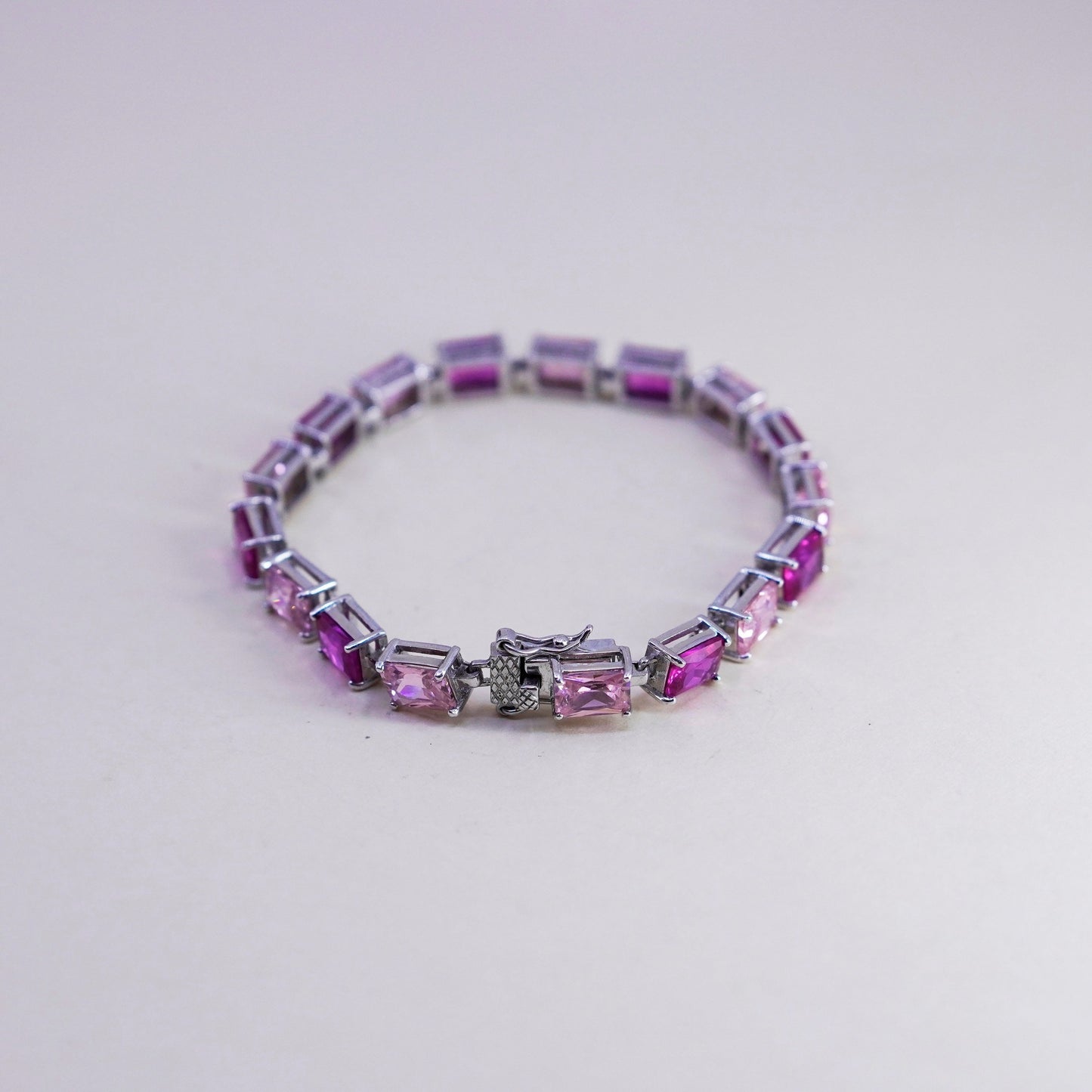 7.25”, vtg Sterling silver fashionable tennis bracelet, 925 chain pink crystal