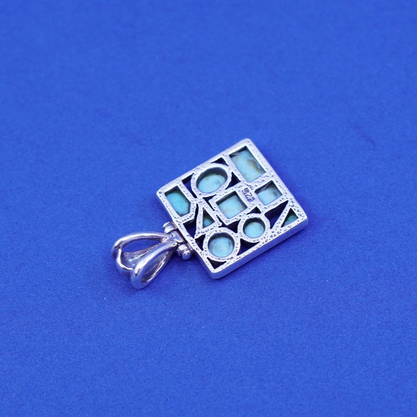 Vintage southwestern Sterling 925 silver handmade pendant with turquoise
