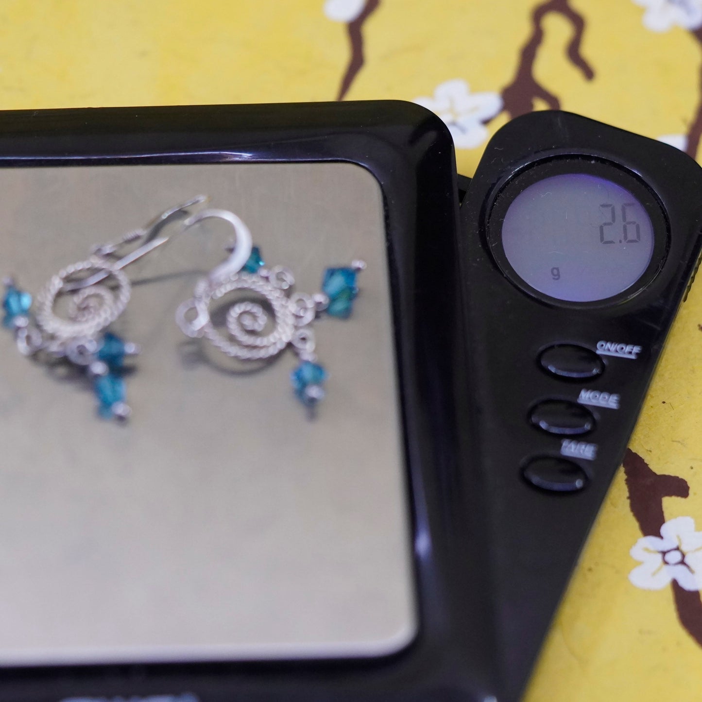 Vintage Sterling silver Handmade earrings, swirly dangle w/ blue crystal drops