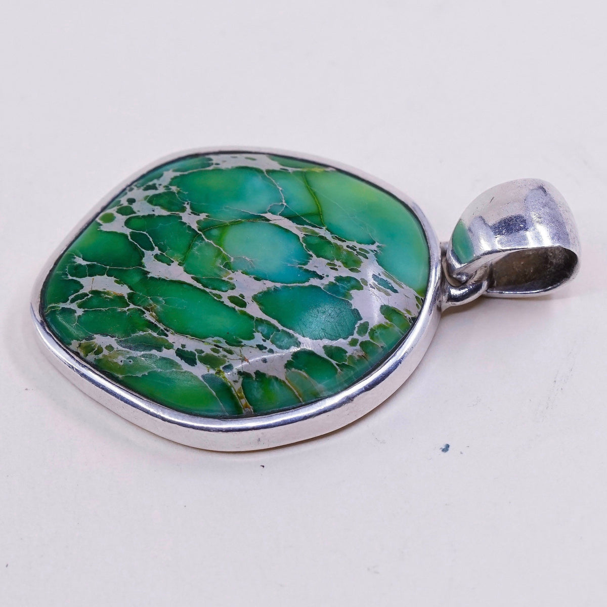 Sterling silver handmade pendant, Mexican 925 w/ Carioca lake turquoise