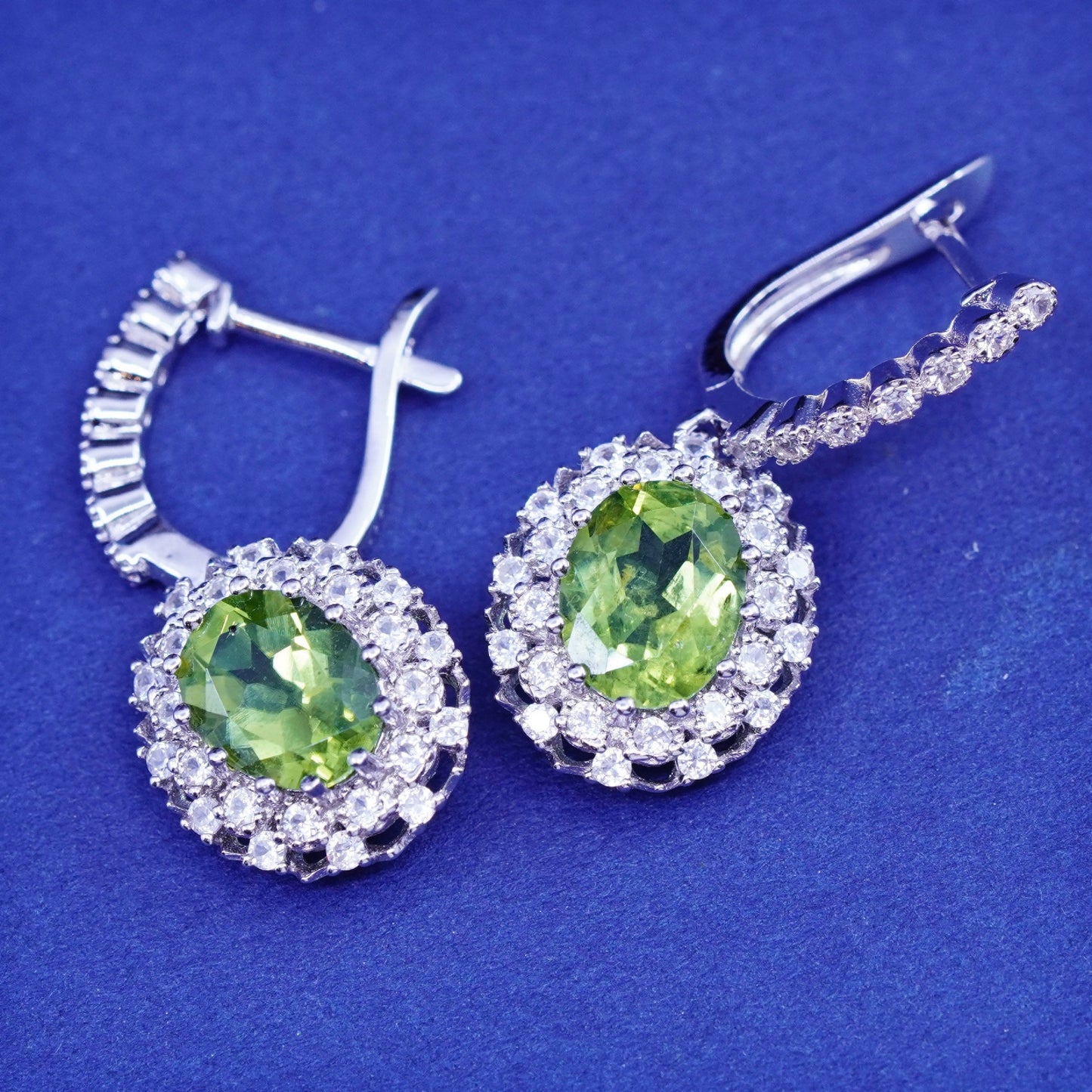 Vintage sterling 925 silver handmade huggie earrings with peridot and cz around