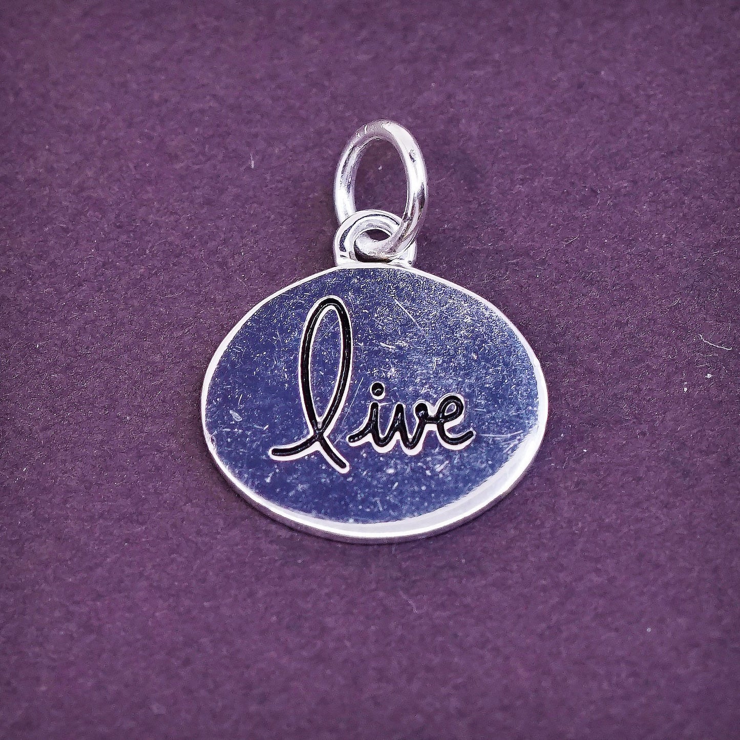 vtg Sterling silver handmade charm, 925 tag pendant embossed “live”