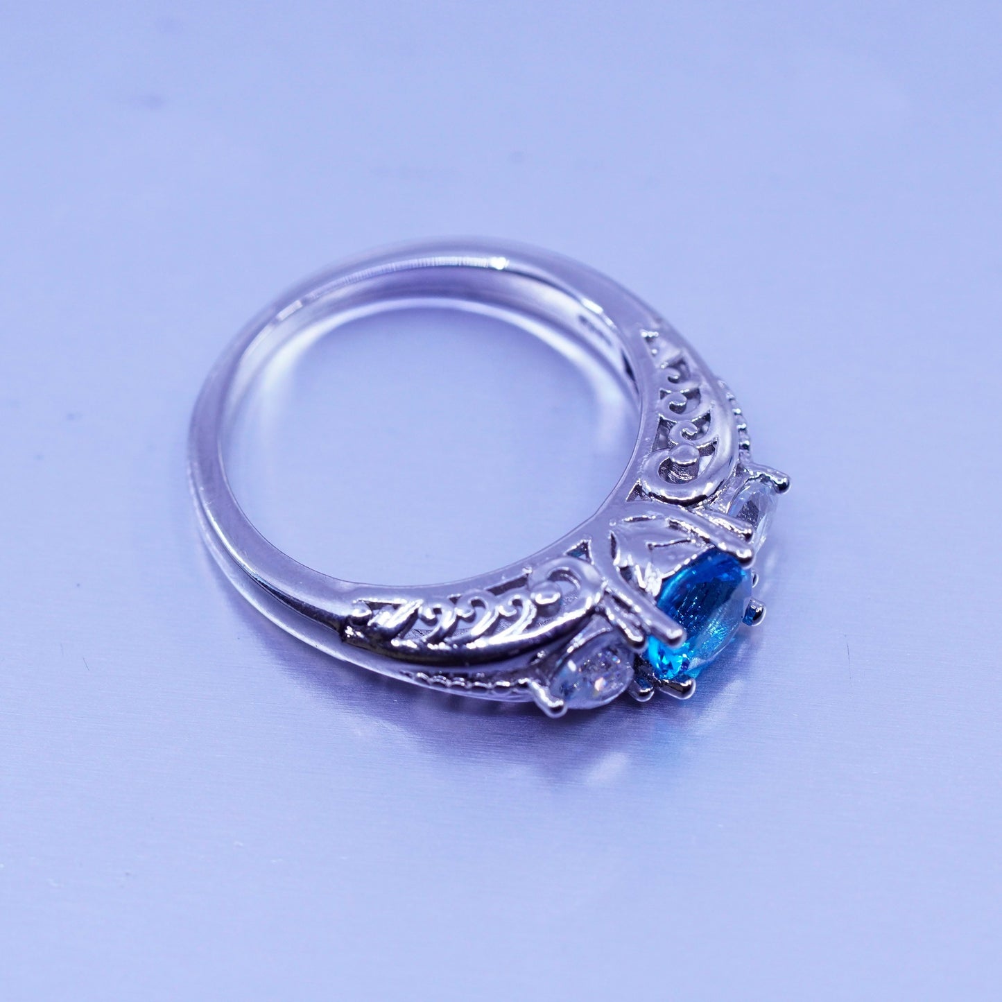 Size 7.75, vintage Sterling 925 silver handmade filigree ring with blue Cz