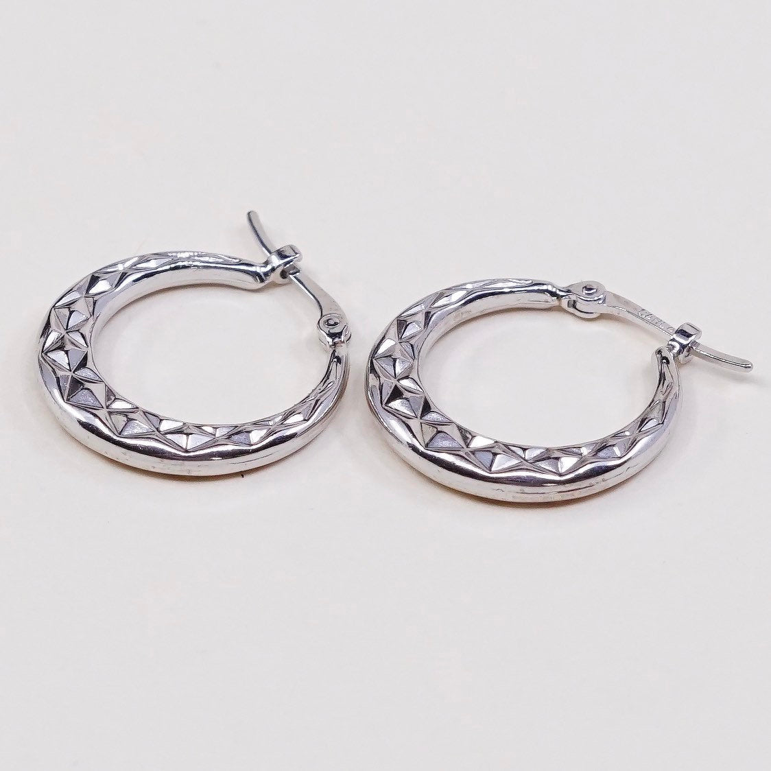 0.5”, caria 14K gold hoops earrings, white puffy huggie w/ Texture