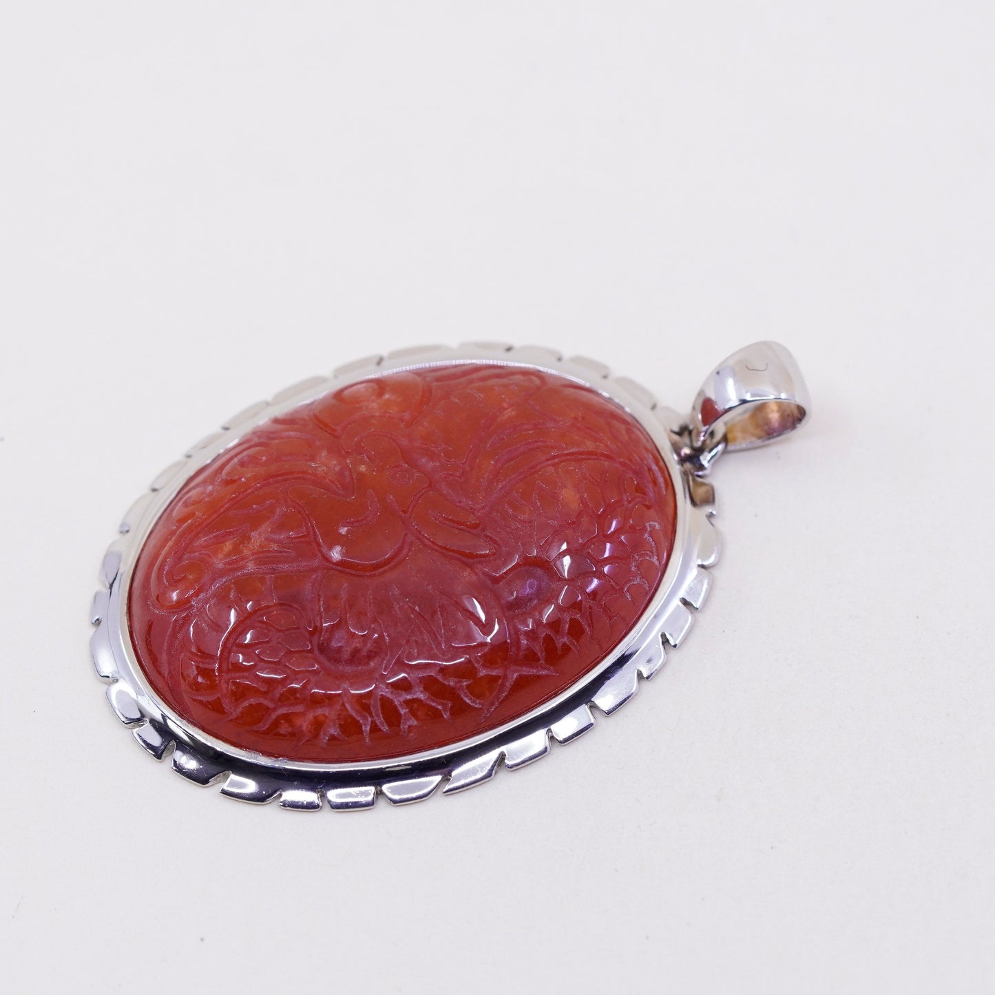 Vintage sterling 925 silver handmade pendant with carved carnelian