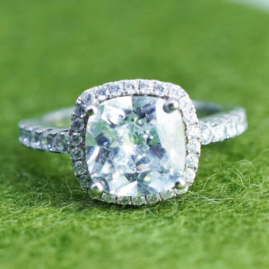 Size 6, Sterling 925 silver engagement ring with emerald cut CZ and cluster cz