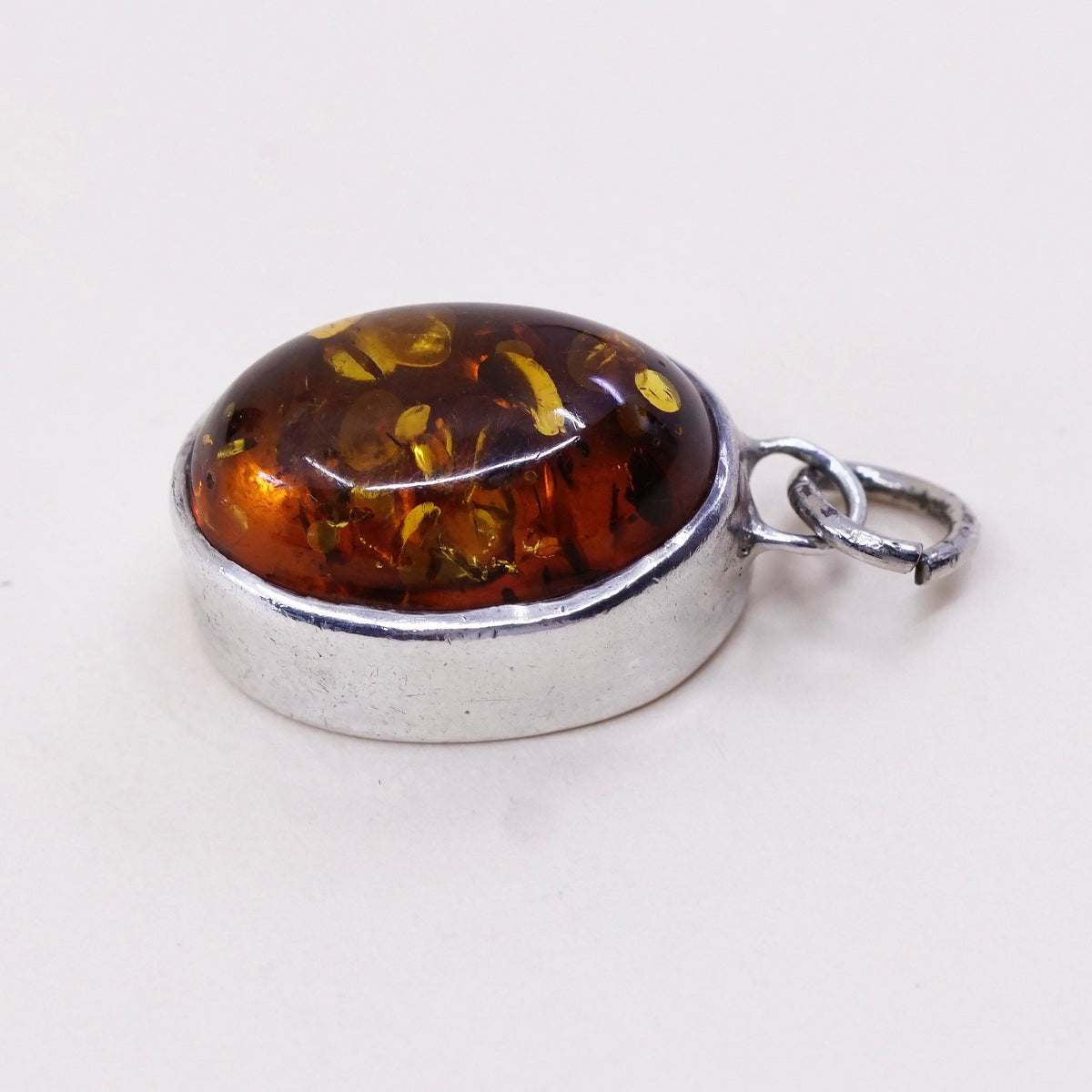 Vintage Lori Bonn sterling 925 silver handmade pendant with oval amber