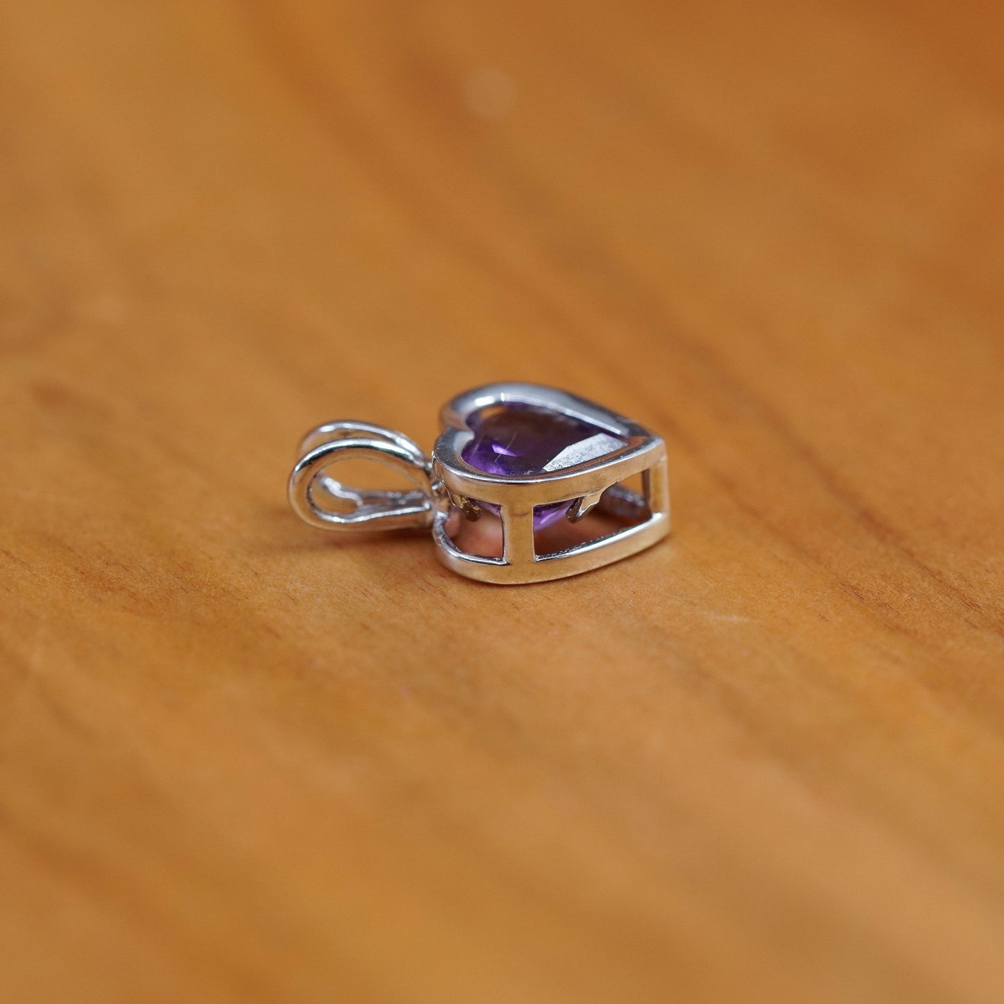 0.6g, Carla 14K white gold heart pendant with amethyst, stamped Carla 14K