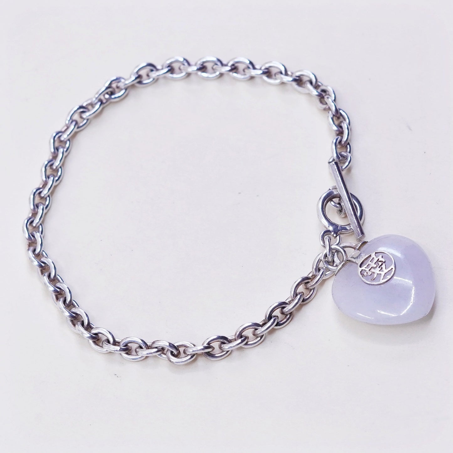 6.75”, sterling 925 silver circle bracelet w/ heart jade charm and “love”