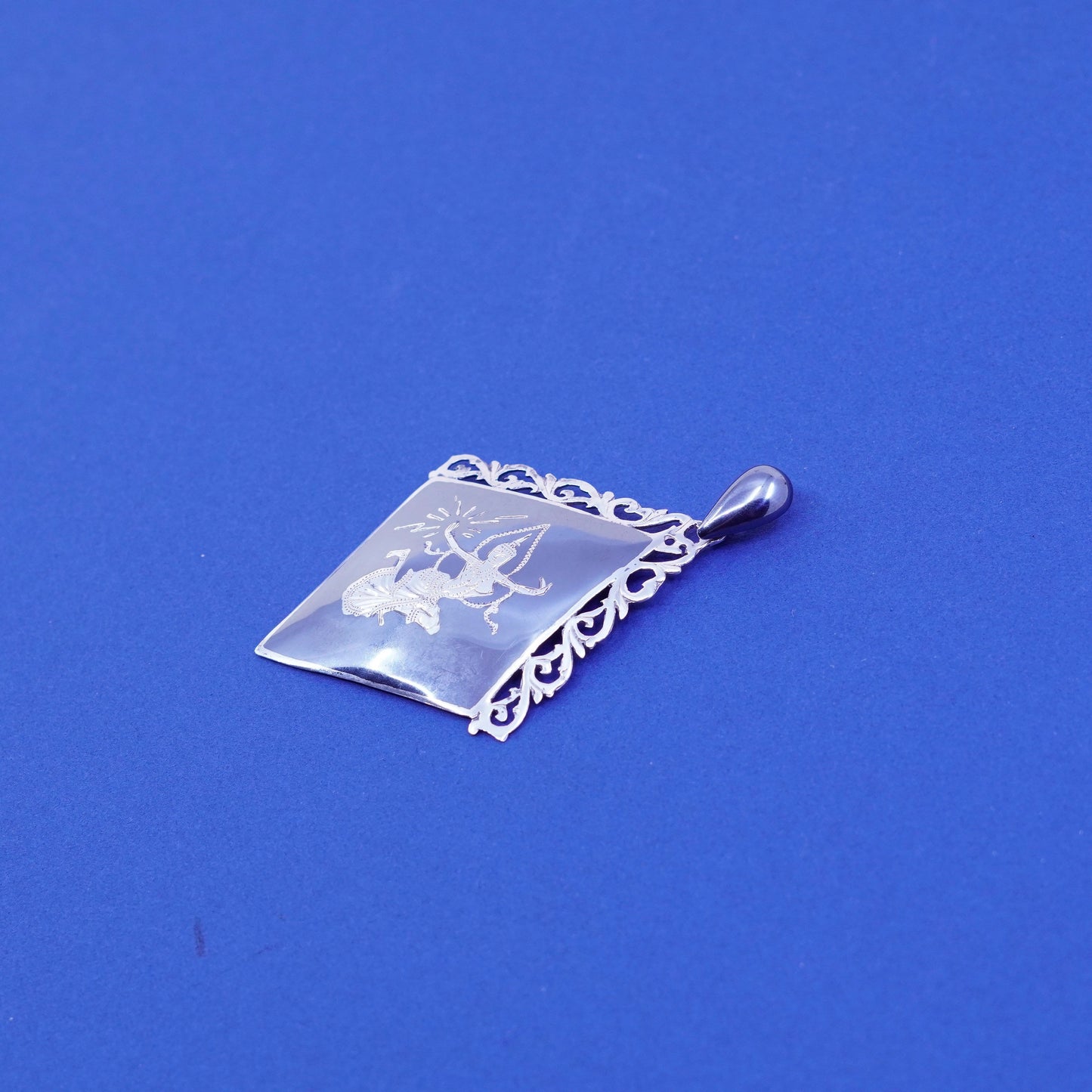 vtg Sterling 925 silver handmade diamond shaped pendant with goddess pattern