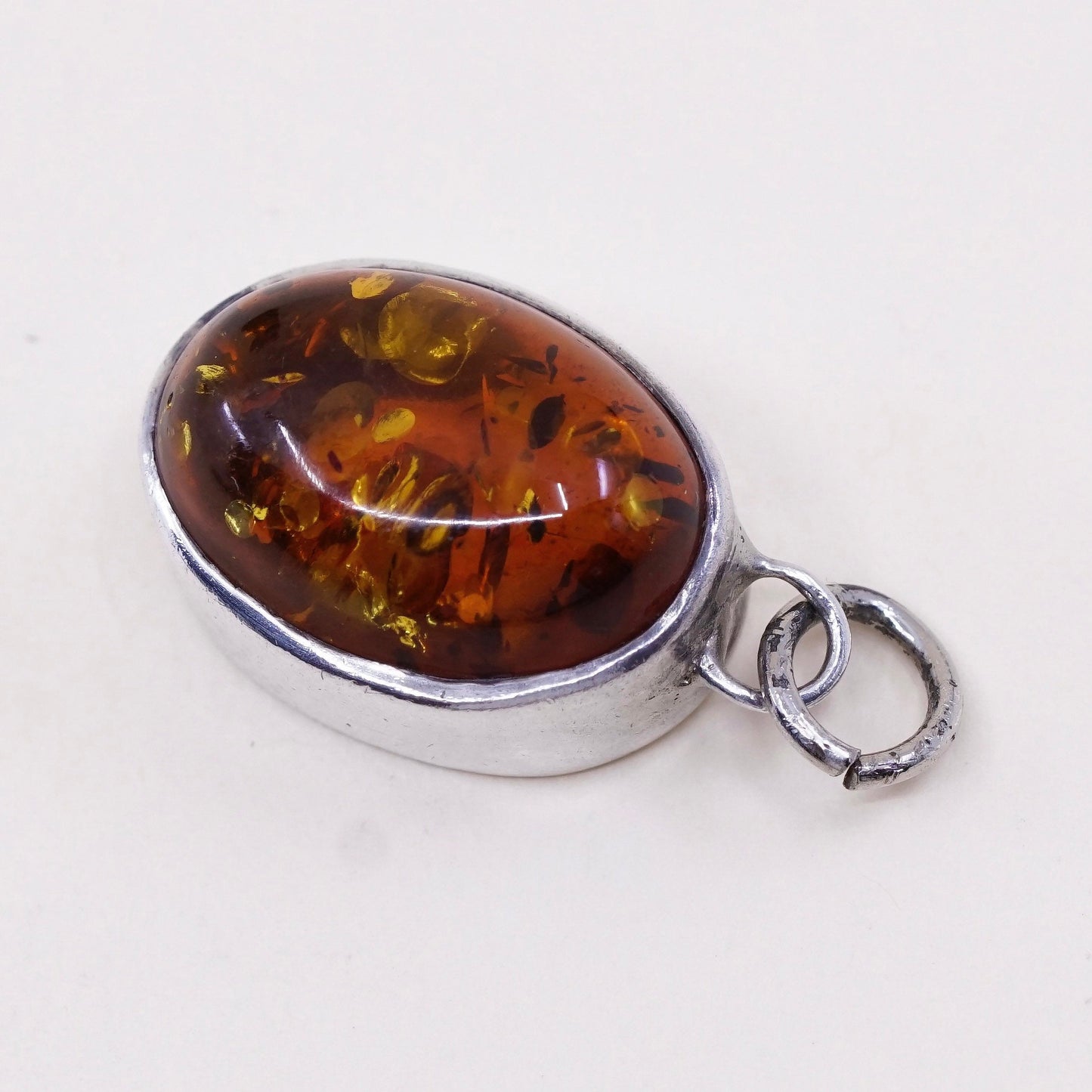 Vintage Lori Bonn sterling 925 silver handmade pendant with oval amber