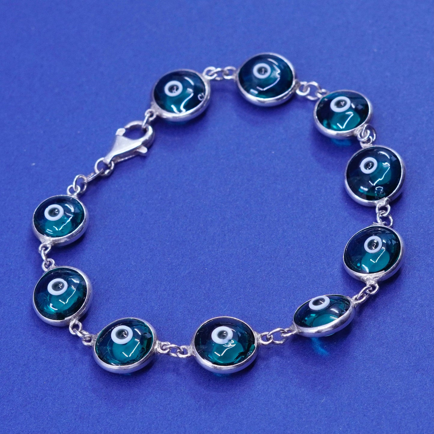 6.75”, Vintage handmade sterling 925 silver bracelet, blue glass evil eye beads