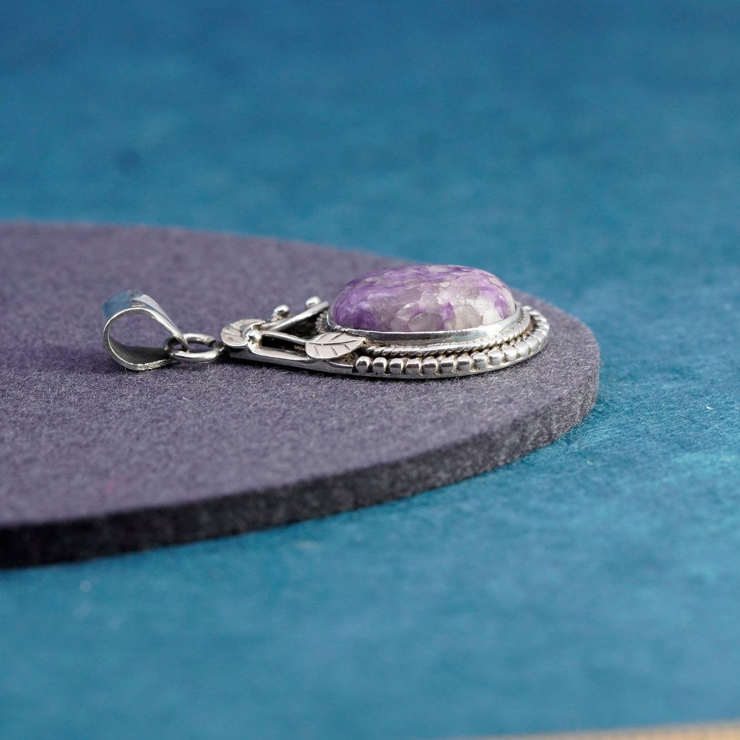 Vintage sterling 925 silver handmade pendant with oval amethyst and leaves