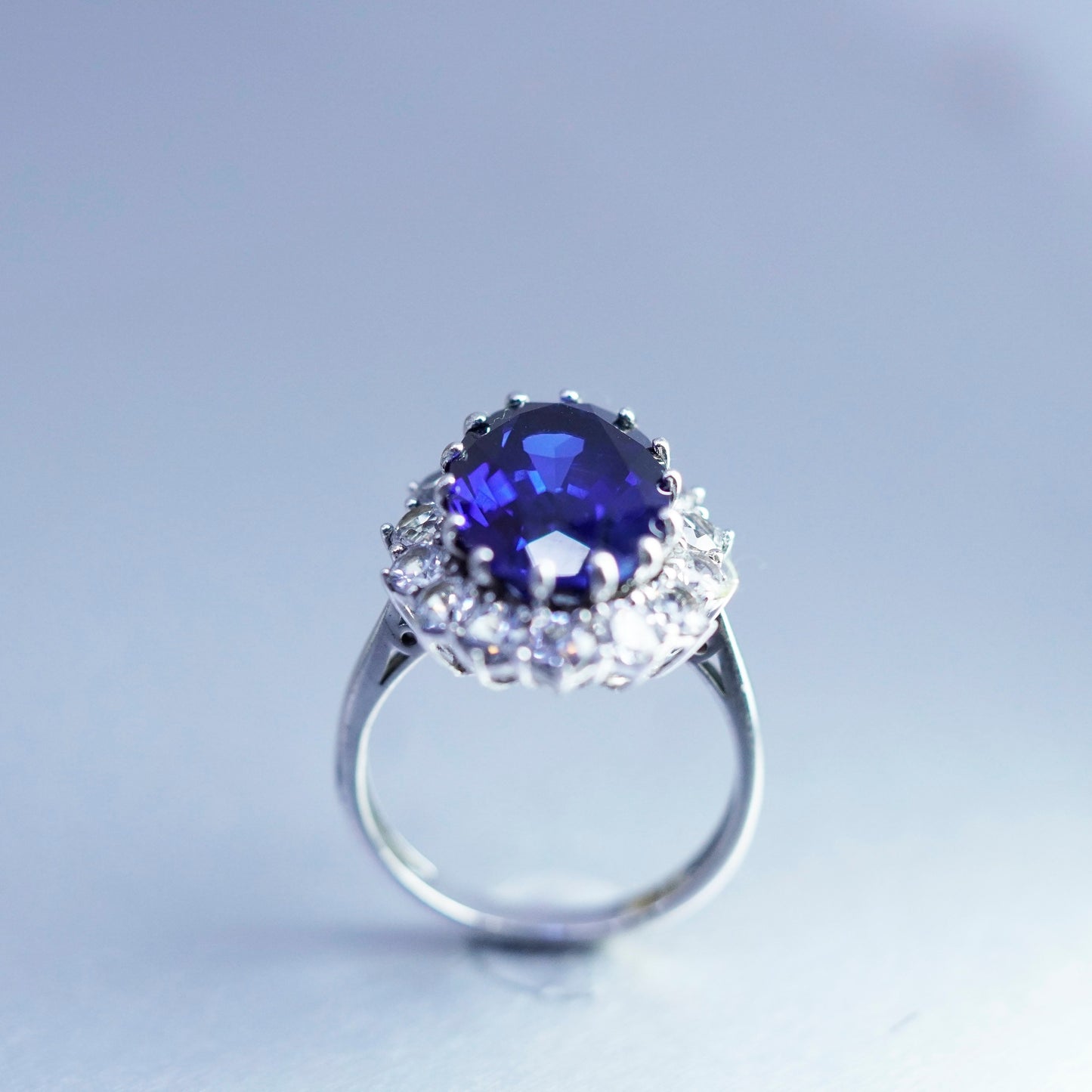 Size 7, vintage Sterling 925 silver handmade ring with sapphire and cz around