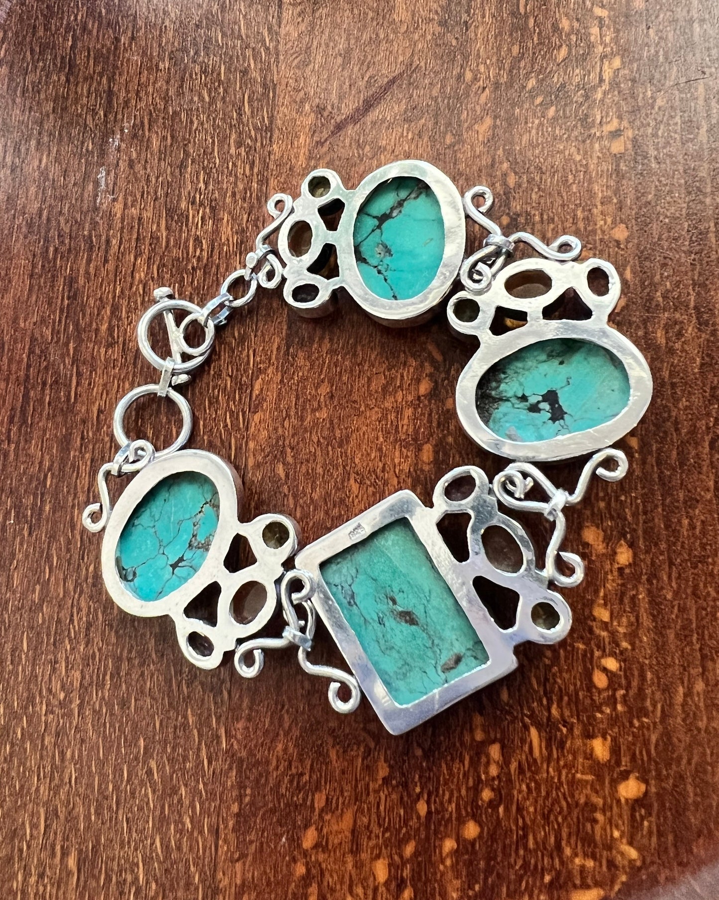 7.25”, southwestern Sterling 925 silver bracelet with dry creek turquoise amber