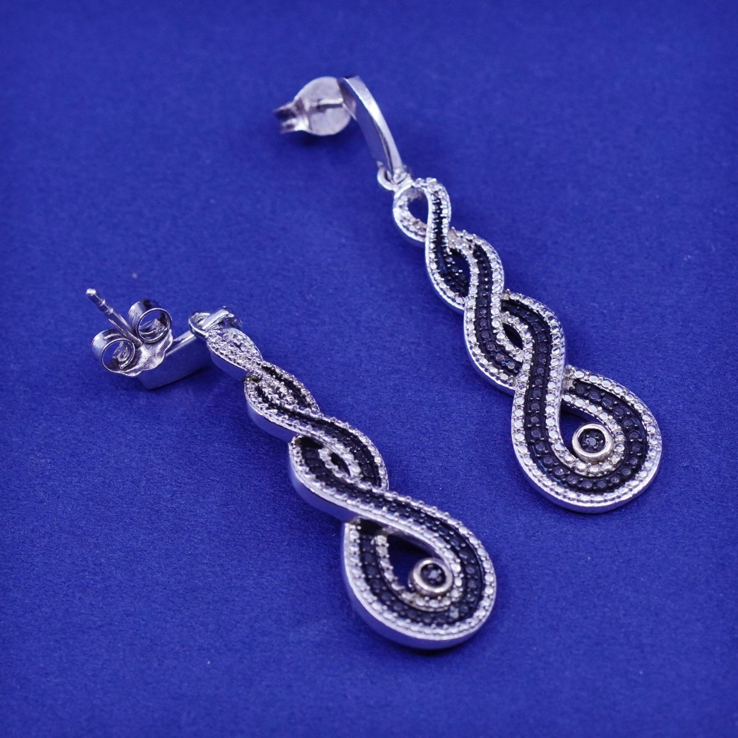 Two Tone Sterling 925 silver entwined earrings with 14K gold accent diamond