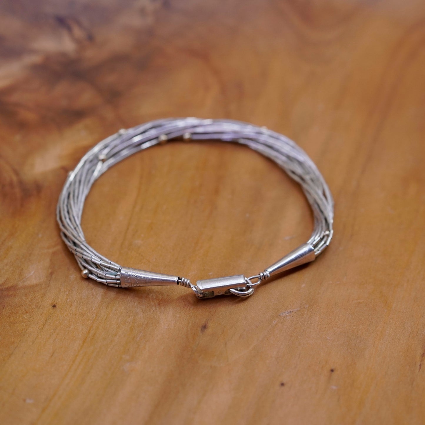 7”, 925 Sterling bracelet, 14 multi strands liquid Silver chain 14K gold bead
