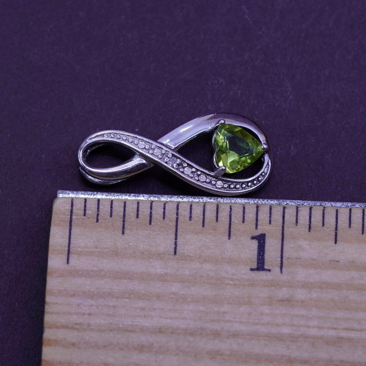 Vintage sterling silver pendant, 925 twisted loop with genuine diamond peridot