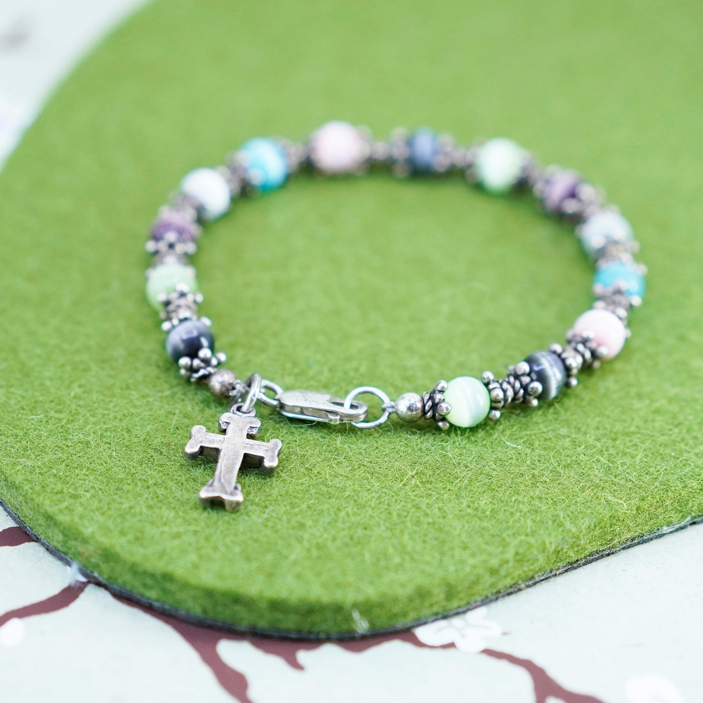 6.75”, sterling silver bracelet, 925 beads with colorful cats eye cross charm