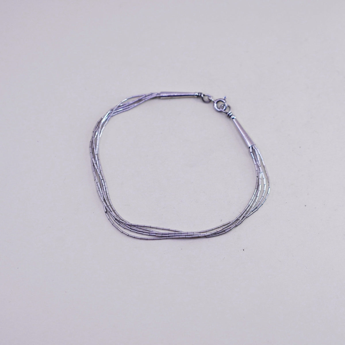 7.5”, Vintage Native American sterling 925 liquid silver multi strands bracelet