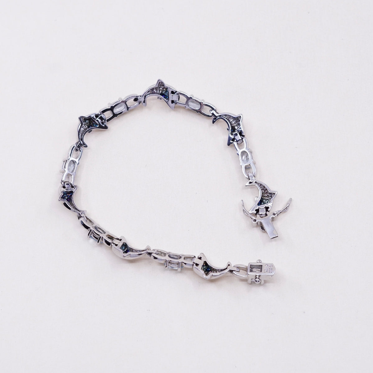 7.25”, vintage Sterling silver handmade bracelet, 925 dolphin links with topaz