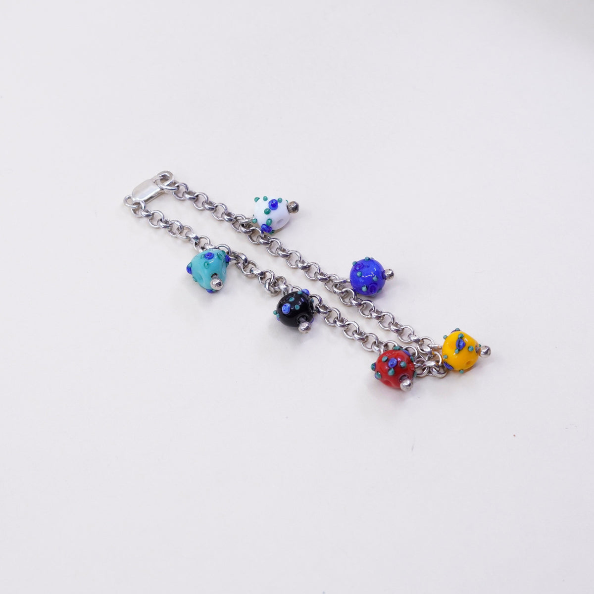 7.25”, 925 Sterling silver circle bracelet w/ artisan colorful glass beads