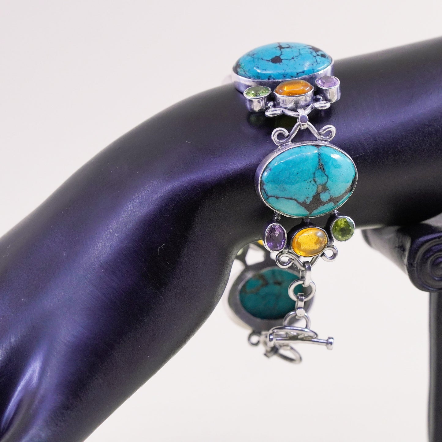 7.25”, southwestern Sterling 925 silver bracelet with dry creek turquoise amber