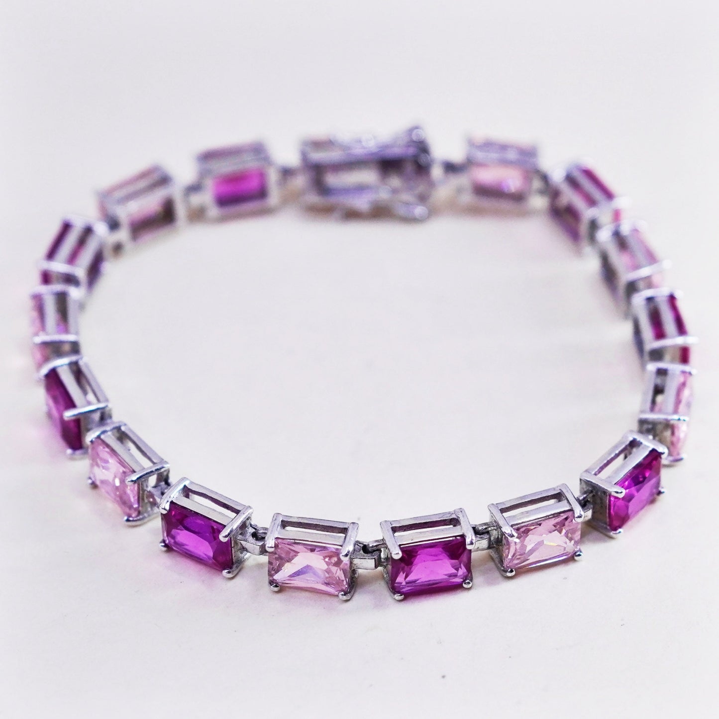 7.25”, vtg Sterling silver fashionable tennis bracelet, 925 chain pink crystal
