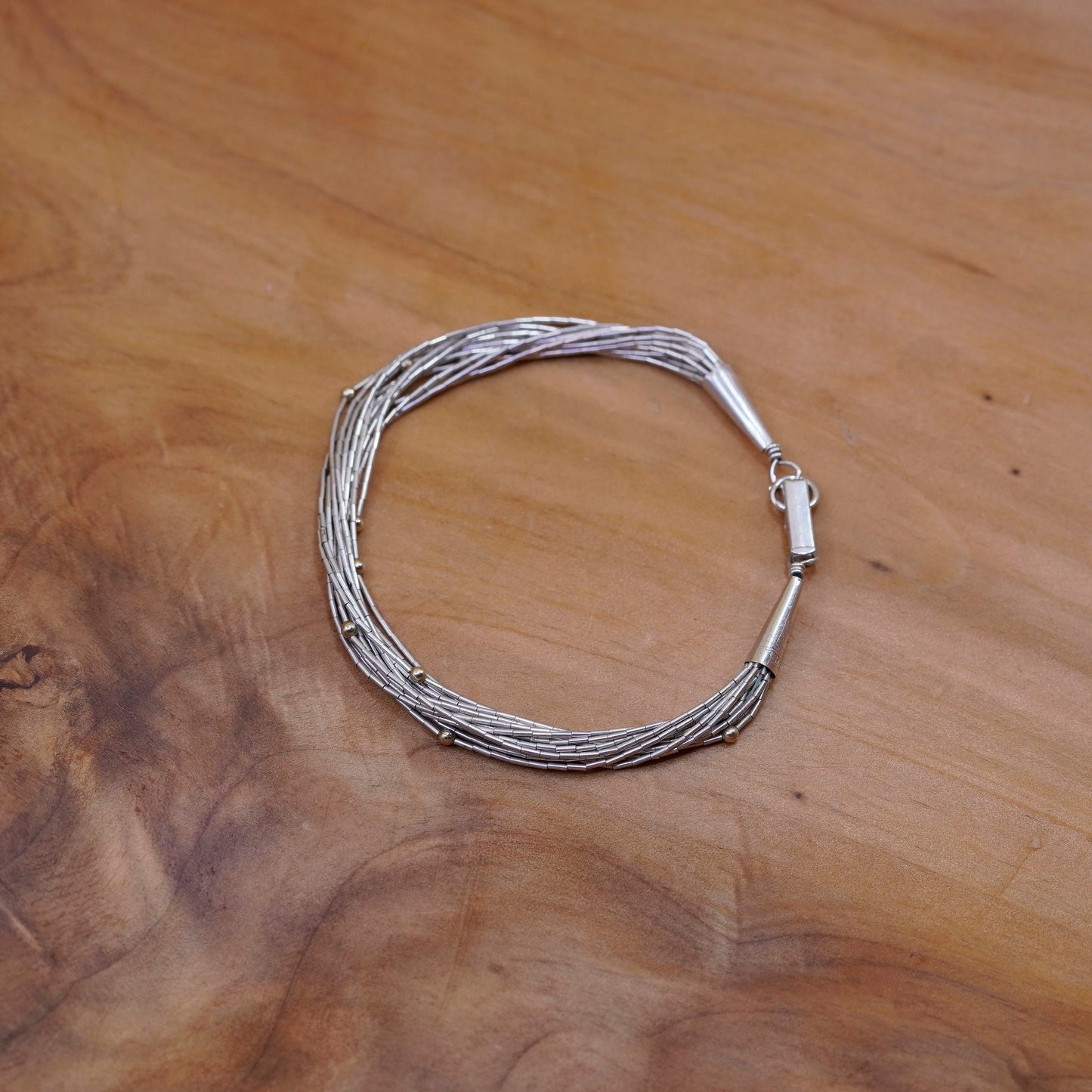 7”, 925 Sterling bracelet, 14 multi strands liquid Silver chain 14K gold bead