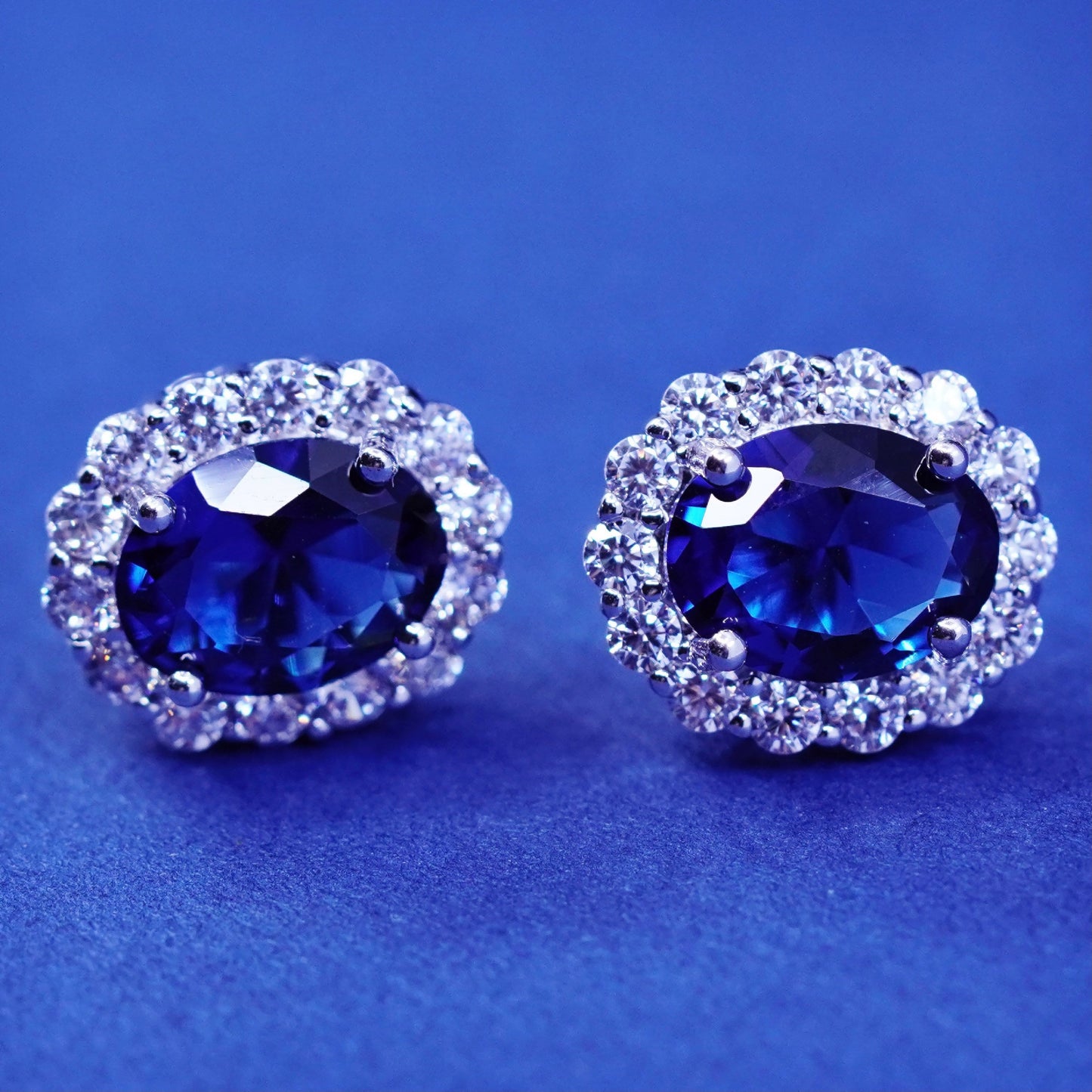 Vintage sterling silver handmade earrings, 925 studs w/ cluster Cz and sapphire