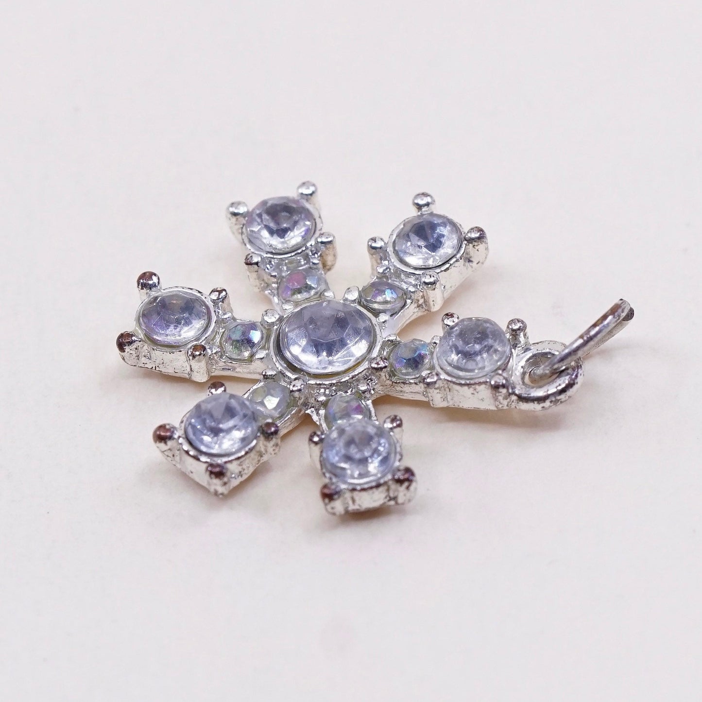Vintage silver tone snowflake pendant charm with Cz