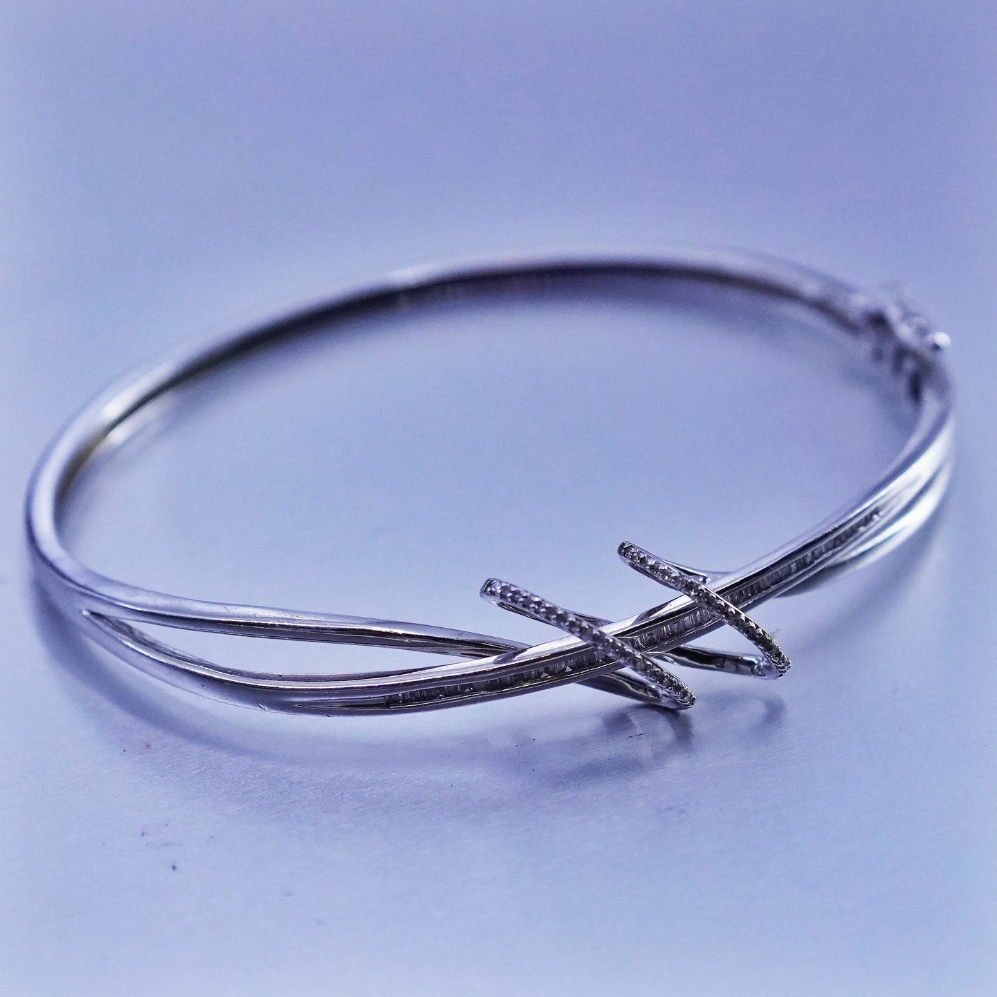 7”, Sterling 925 silver bracelet, entwined hinged bangle with cluster diamonds
