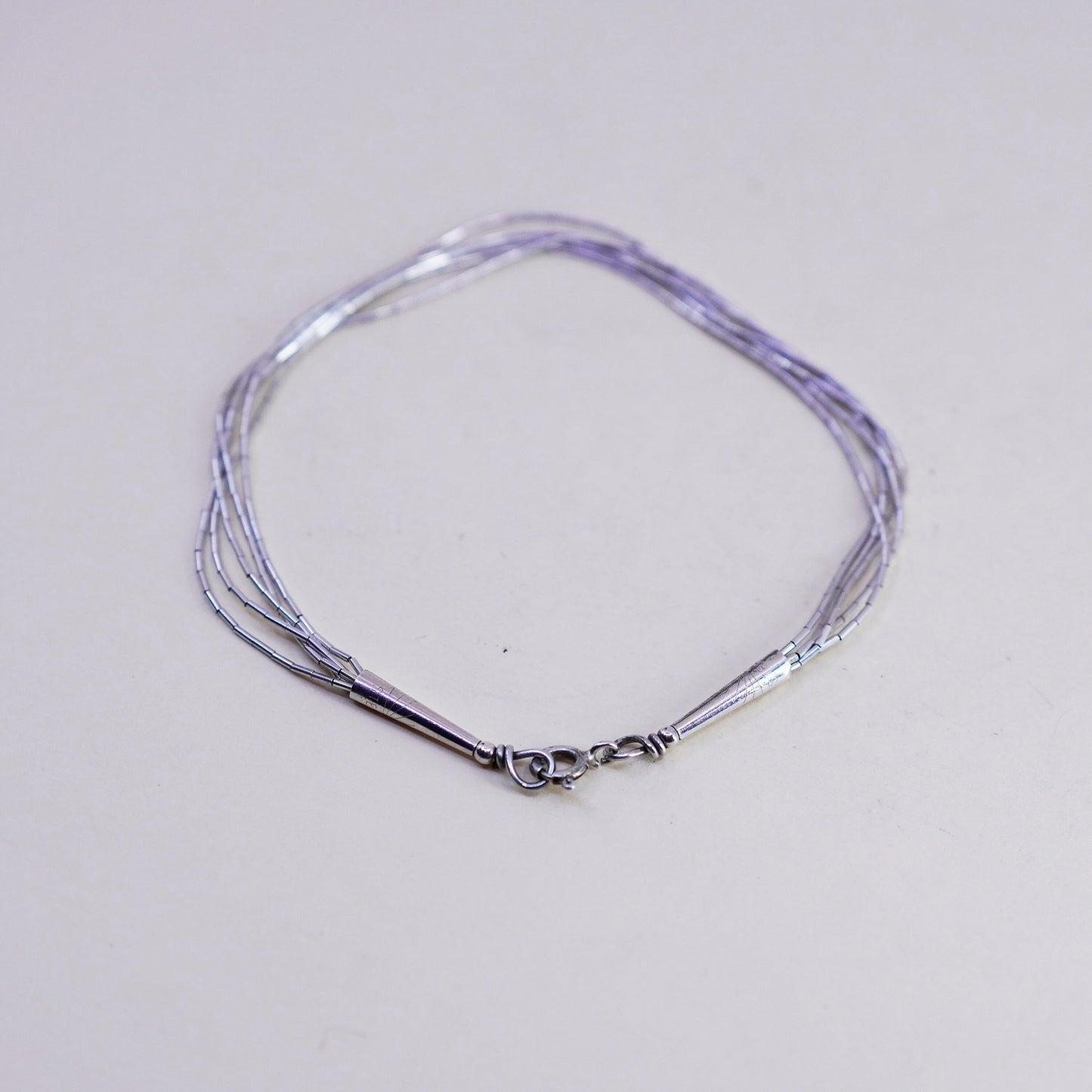 7.5”, Vintage Native American sterling 925 liquid silver multi strands bracelet