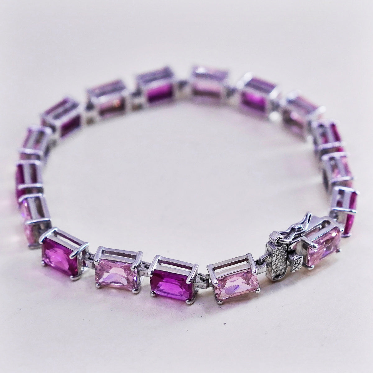 7.25”, vtg Sterling silver fashionable tennis bracelet, 925 chain pink crystal