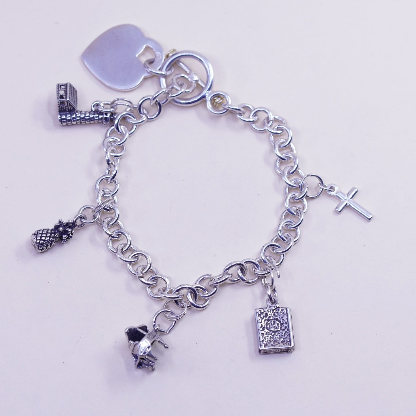 6.75” sterling silver bracelet, bold circle chain heart bible cross piano