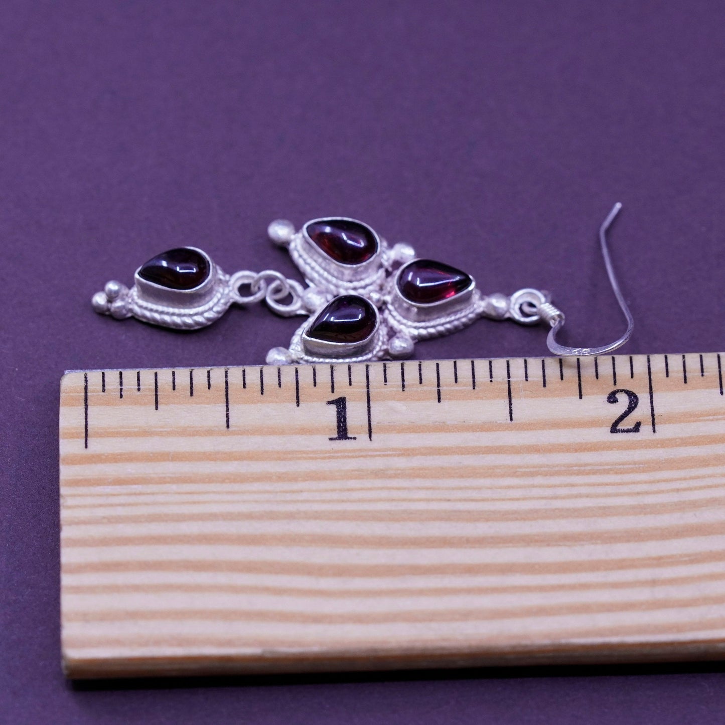 Vintage Nepal Sterling silver handmade earrings with teardrop garnet and cable