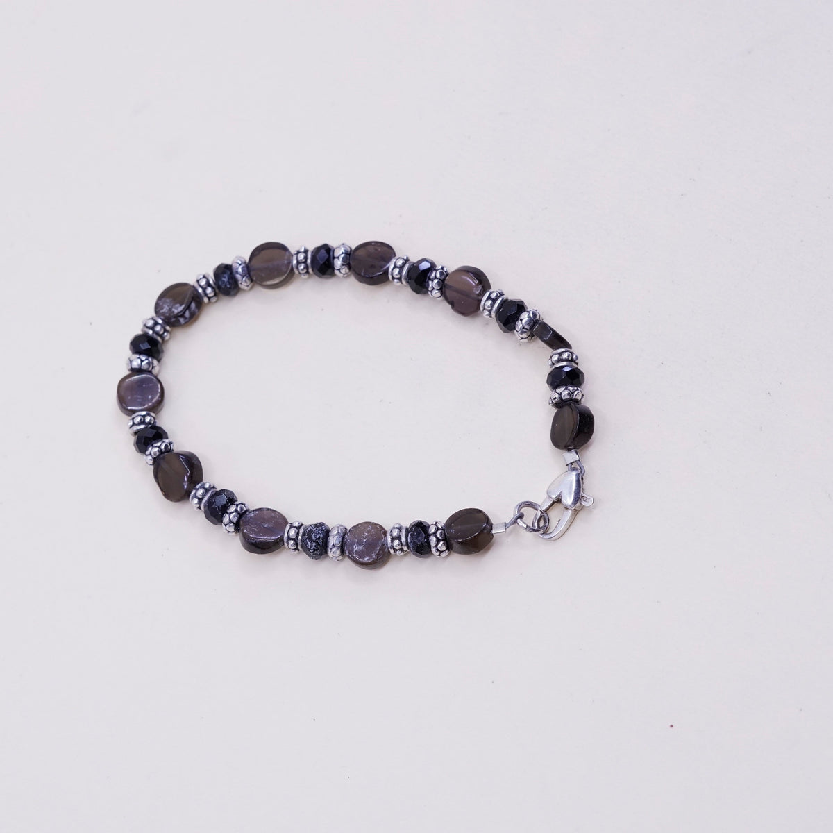 7”, sterling silver handmade bracelet, 925 beads w/ smoky crystal N heart clasp