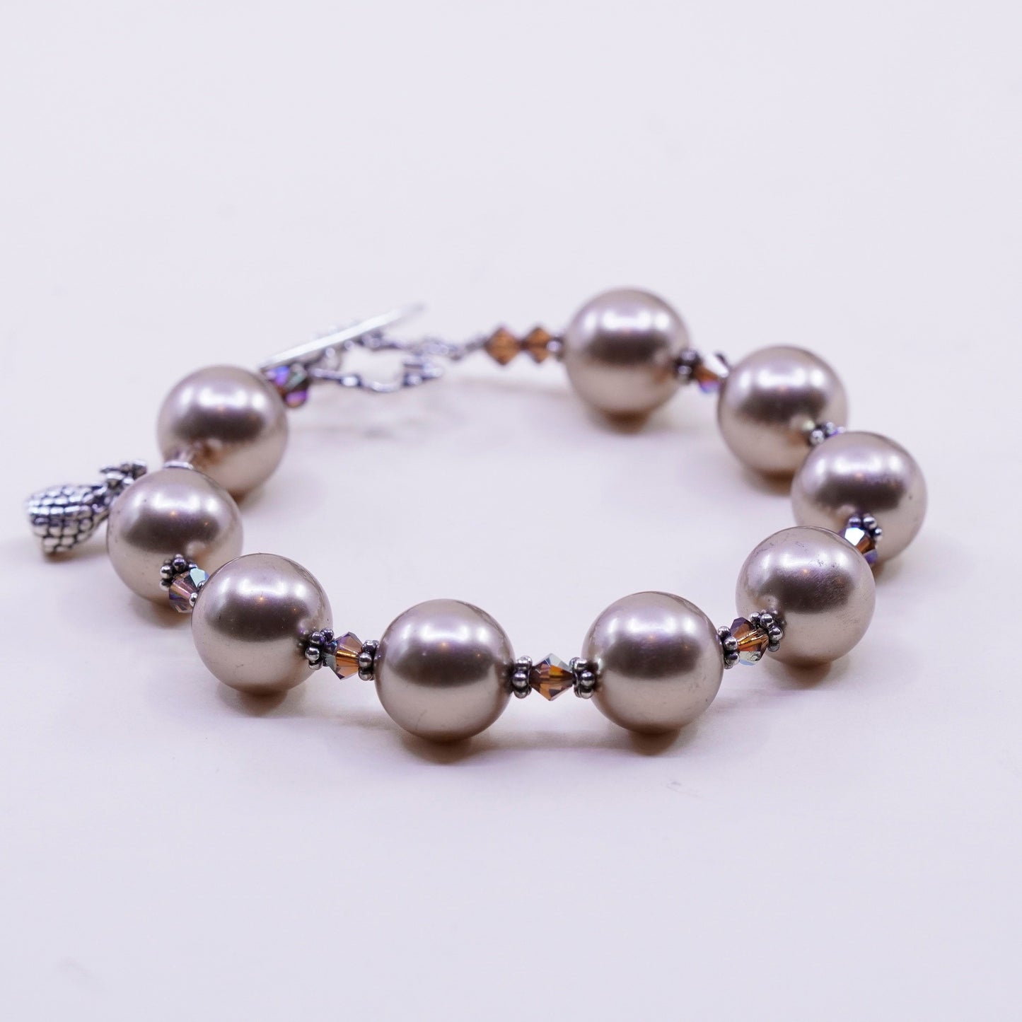 6.5”, handmade bracelet, faux pearl with 925 silver clasp and pineapple charm