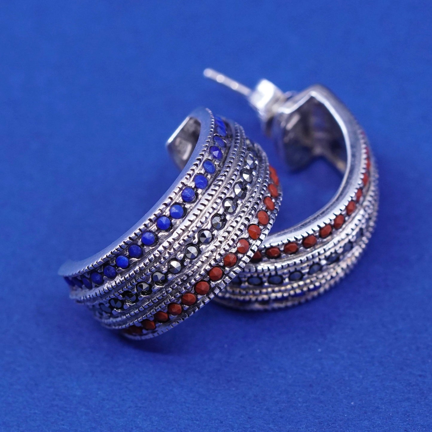 0.75”, Sterling silver earrings, 925 Huggie hoops w/ marcasite ruby Sapphire