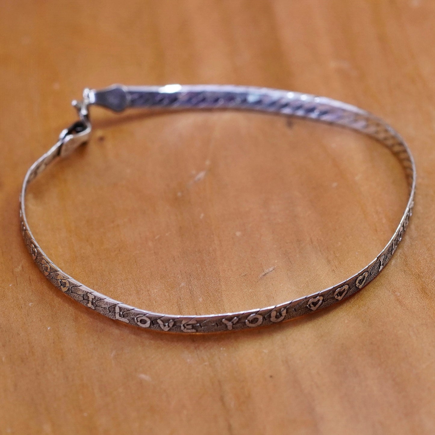 6.75”, Vintage Sterling silver star herringbone bracelet embossed “love you”